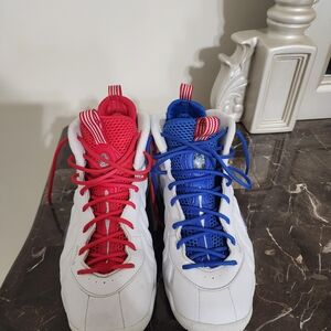 Kids Nike Foam Foamposite White Sneakers with Red & Blue Accents